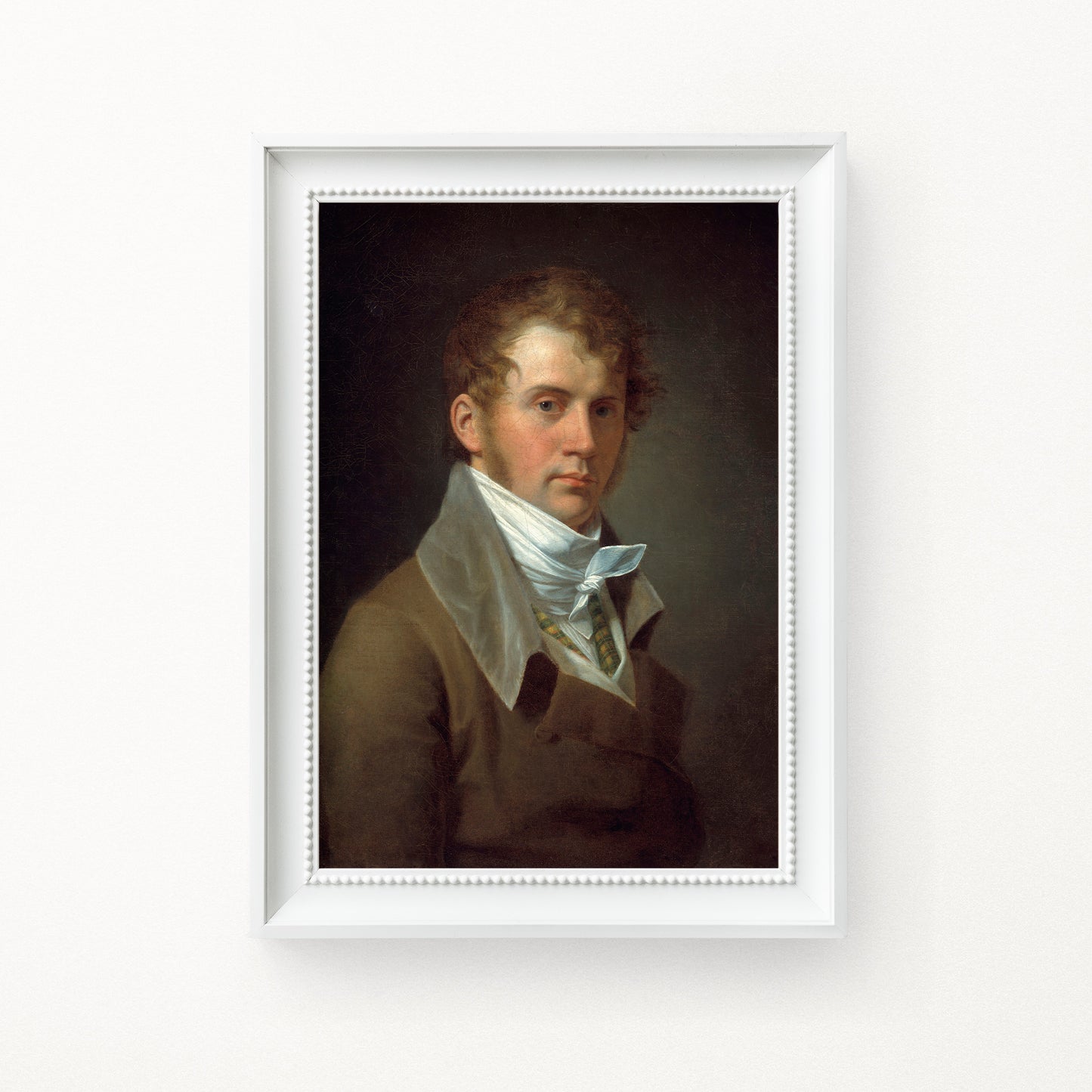 Framed portrait of a man with a white cravat, on a dark background