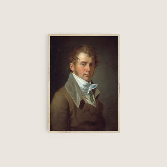 Framed portrait of a man with a white shirt and brown jacket on a light gray background