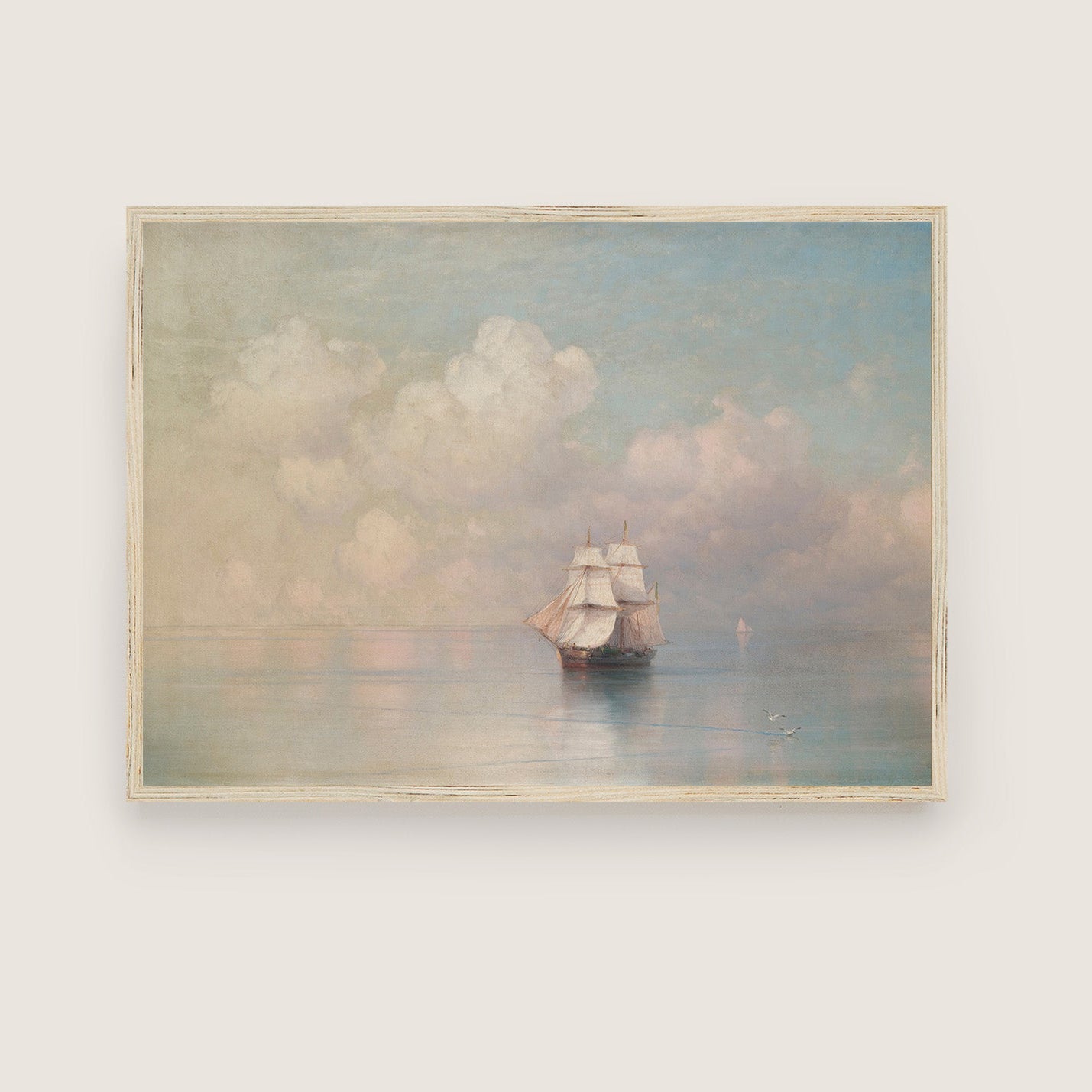 Framed painting of a ship on water with clouds in the background
