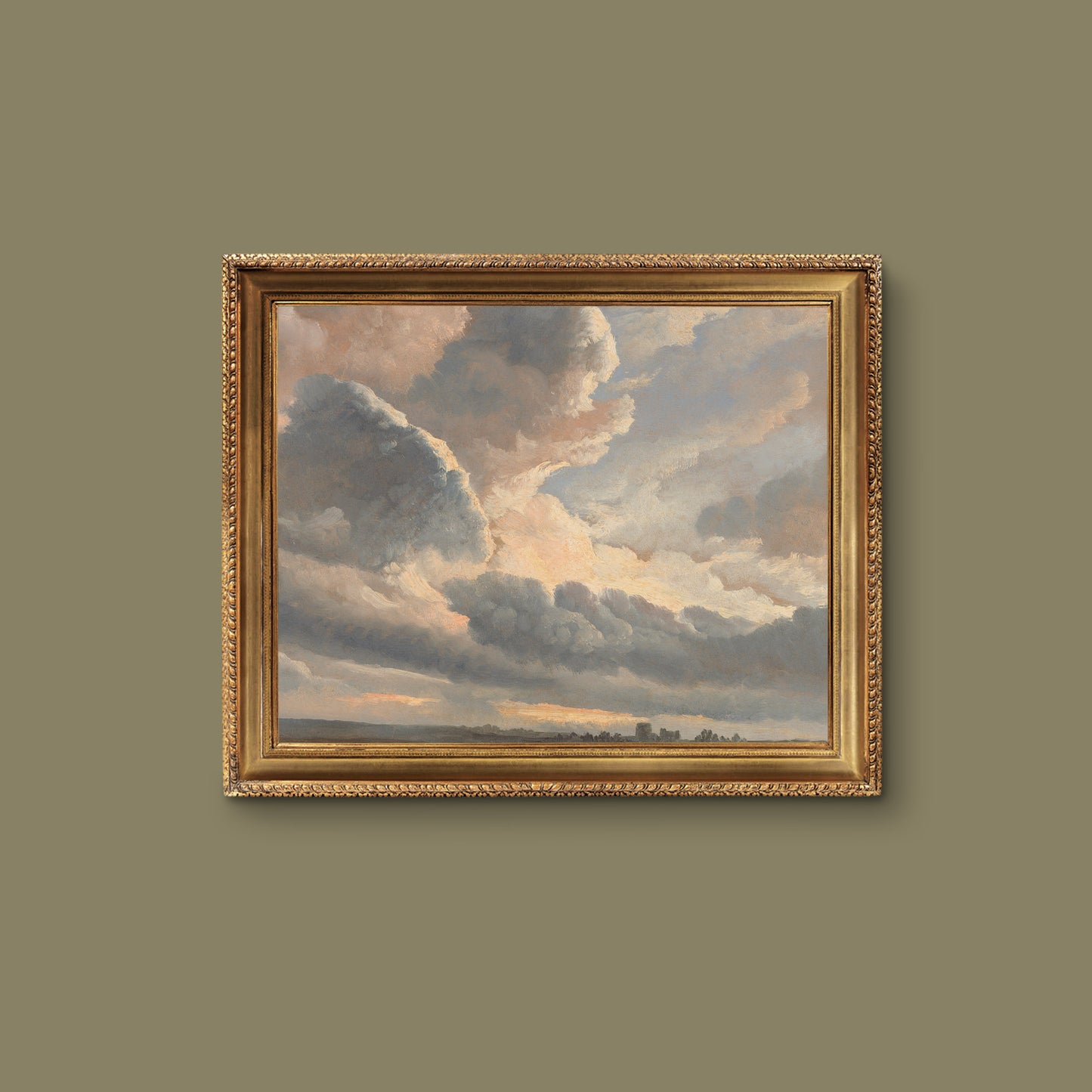 Framed painting of a cloudy sky on a green wall