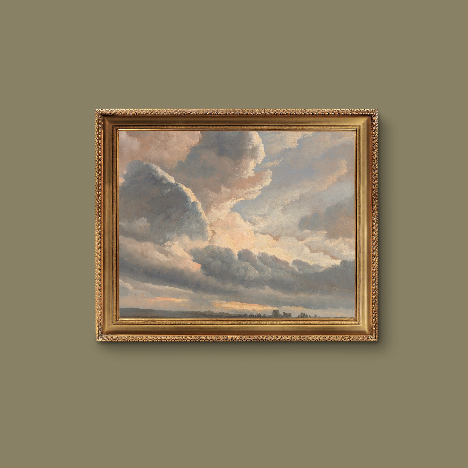 Framed painting of a cloudy sky on a green wall