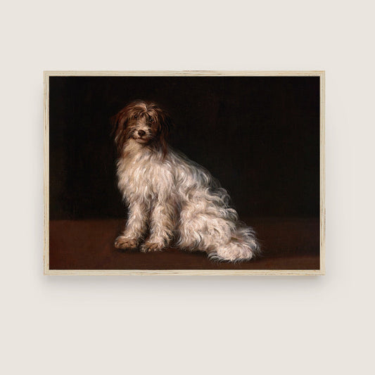 Framed artwork of a dog on a dark background hung on a light-colour wall.