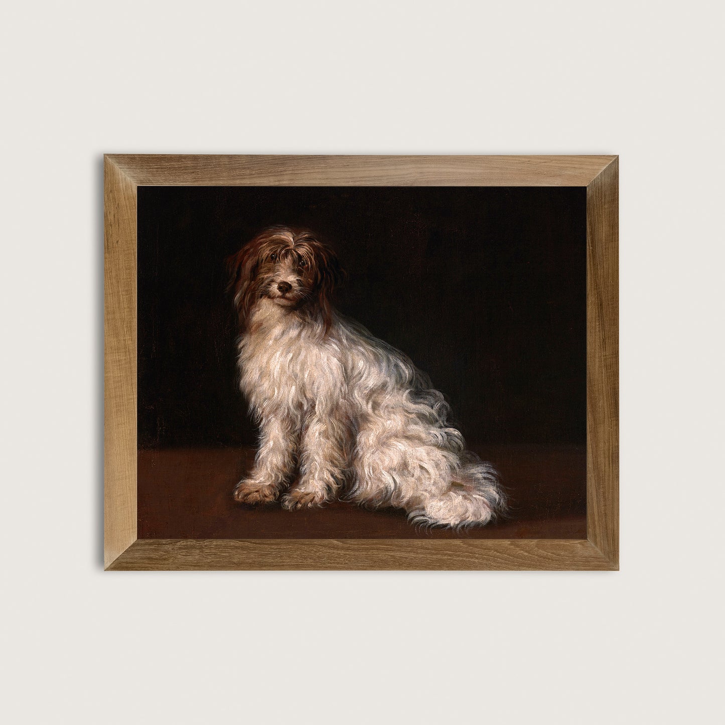 Framed art print of a dog sitting on a dark background in a wooden frame.