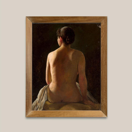 Framed print of a nude figure sitting with a wooden frame.