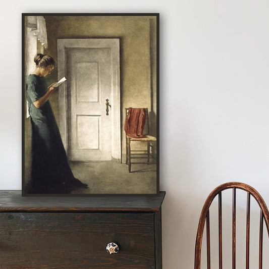 Wooden chair in front of a dark wooden dresser with a mirror on top