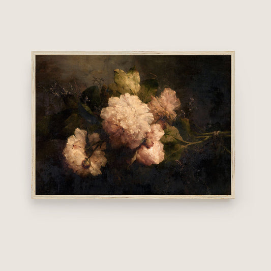 Framed artwork of flowers on a plain wall