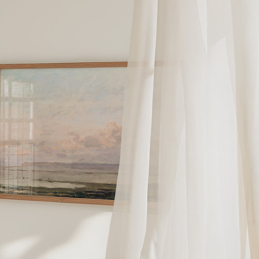 A video of a framed print of a landscape.