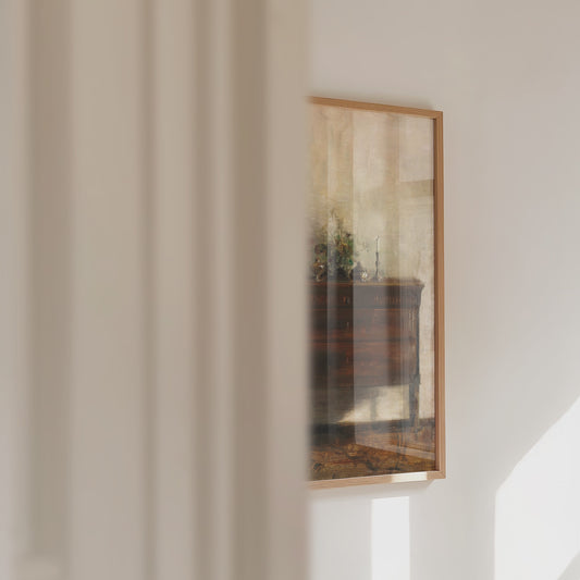 Woman Reading by a Dresser in a Calming Interior Scene