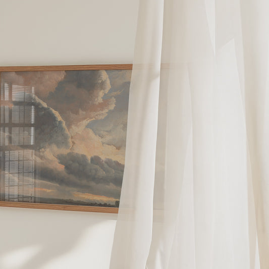 A video of a framed cloud study print