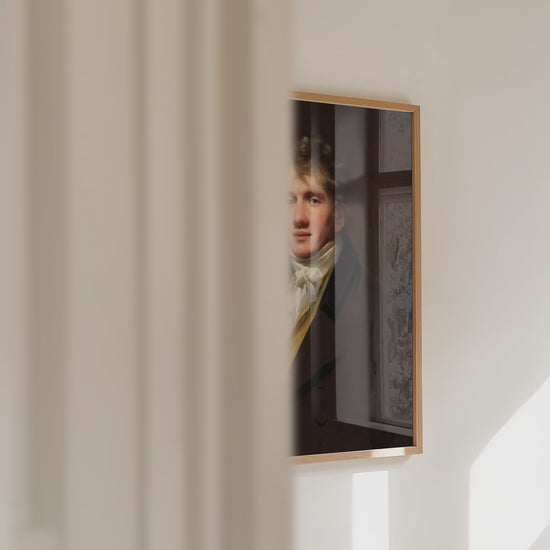 A video panning across a framed portrait print.