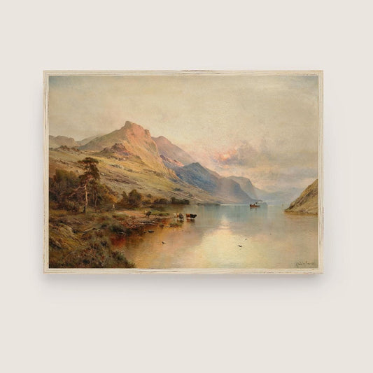 A fine art print of a glowing Highland landscape. The print is displayed in a thin wooden picture frame.